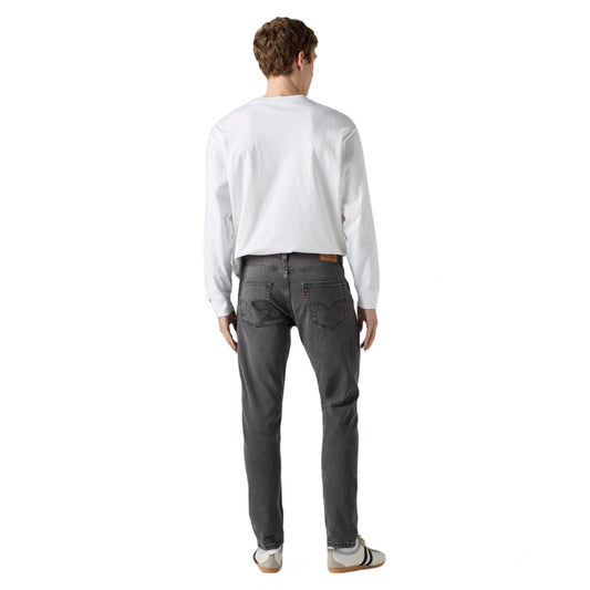 جينز بقصة ضيقة ومستدقة (Slim Taper Fit)